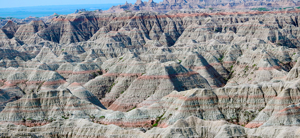 Badlands National Park, South Dakota - USA: This Park the Badlands National Park in South Dakota is a great location to visit and very popular for those desiring to enjoy the very special views and on this June day it was popular with a group viewing the area.