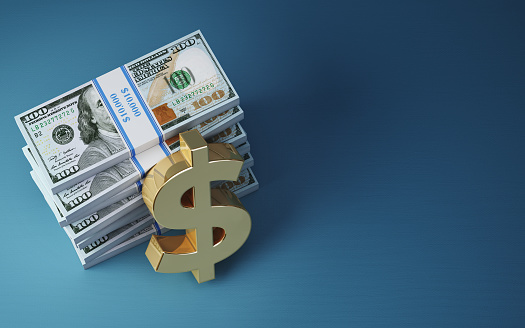 3d render Stack of 100 Dollar Bills Banknote  and Dollar Signs on Soft Blue Background, It can be used for concepts such as economy, finance, trading, country economies, Depth Of Field