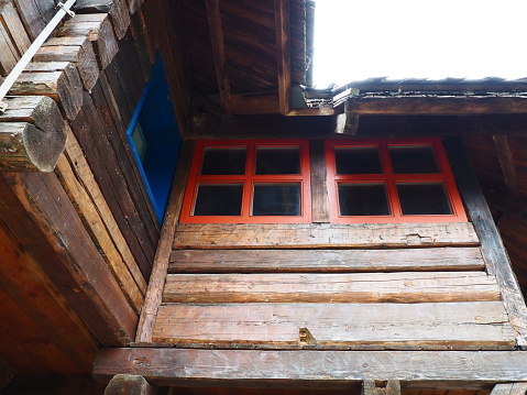 A window of an old country house building.