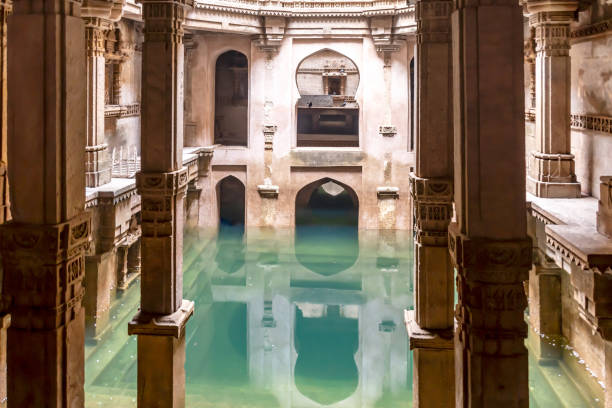 istock Adalaj Stepwell with stored clyster clear natural water in well 1955254151