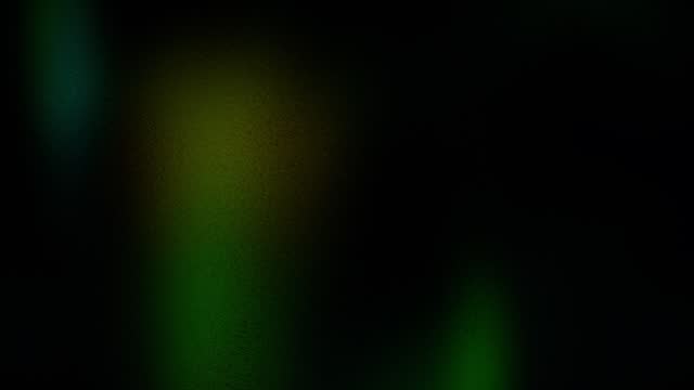 Abstract de-focused green and yellow light leak gradient background