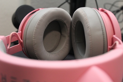 Close up of pink headphones