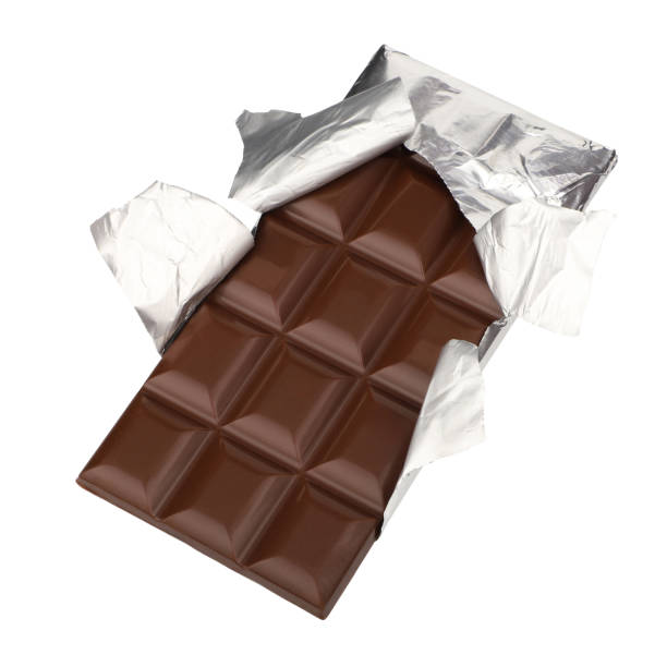 istock Milky chocolate isolated on a white background. dark chocolate wrapped in an aluminum package. clipping path. 1955349974