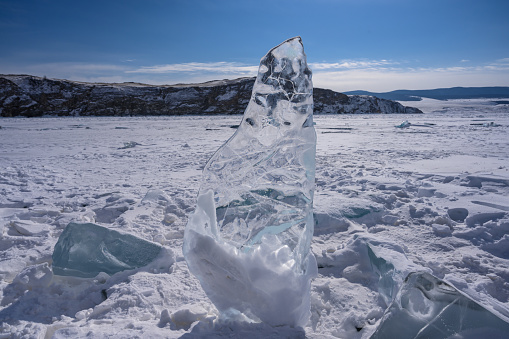 Ice hummock on the ice of lake Baikal. On the ice of Lake Baikal. beautiful pieces of ice.
