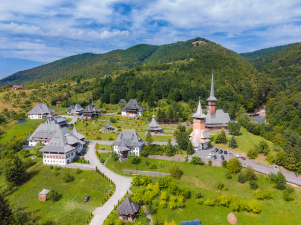 Aerial photography of Barsana monastery located in Maramures County, Romania Aerial photography of Barsana monastery located in Maramures County, Romania. The landscape photography was taken from a drone at a higher altitude with the beautiful wooden monastery in the view. maramureș stock pictures, royalty-free photos & images