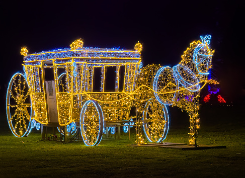 Mainau, Germany - December 27, 2023: A Christmas garden is a Christmas event with beautiful light creations and illuminations on the island of Mainau on Lake Constance