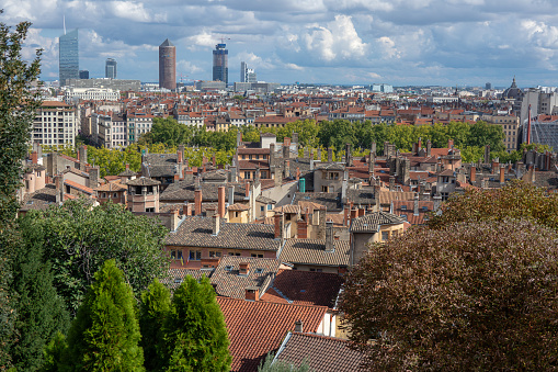 View from the UNESCO World Heritage district of Fourviere in the French city of Lyon, looking across the rooftops of the historic part of the city, to the modern financial district beyond.
