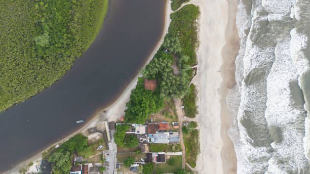 Lighthouse of Farol das Conchas, Ilha do Mel, Paranaguá, Paraná State, Brazil.. Photo 01/21/2013.