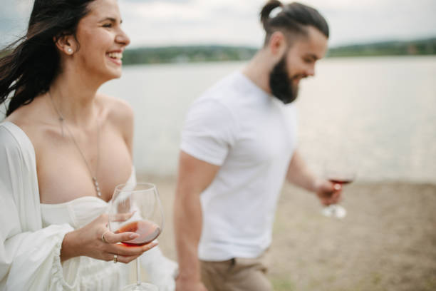 istock Couple walking by the lake 1955565944