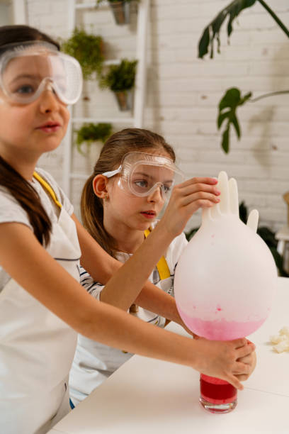 istock Children making experiments and having fun at home 1955570689