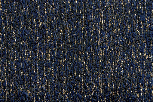 Blue and gold color textile texture macro close up view