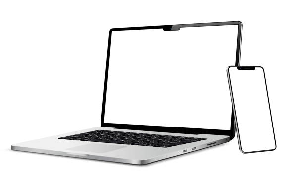 istock Laptop and cellphone with blank screen. Flat lay detailed and realistic devices mockup 1955631739