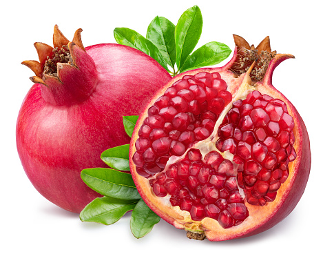 Pomegranate fruit, leaves and piece of pomegranate isolated on white background. File contains clipping path.