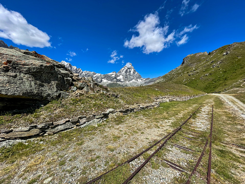 Matterhorn peak with an abandoned railway track in summer, Aosta Valley, Italy