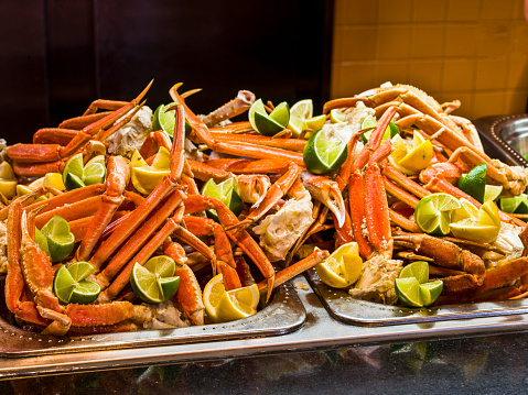 You'll want to get to the steamed crab legs buffet quickly as they won't last long. The seafood lovers delight of stacked steamed crab legs topped with fresh limes and lemons.