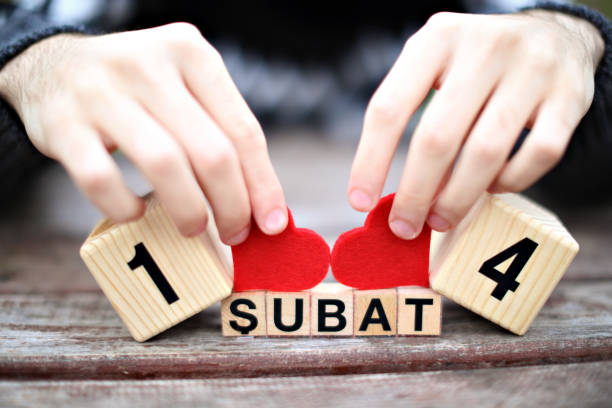 istock St valentines day cube unrecognize man holding hearth, 14 February Love. Romantic. concept stock photo 1955699549