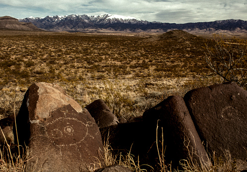 Native Americans and Spanish settlers carved symbols onto volcanic rocks from 400-700 years ago. These are a valuable record of spiritual and cultural expression by the early settlers. The Petroglyph National Monument protects one of the largest sites in North America.