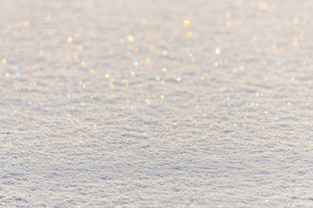 Thin layer of shiny snow on the ice. Bas-Rhin, Alsace, Grand Est, France, Europe.