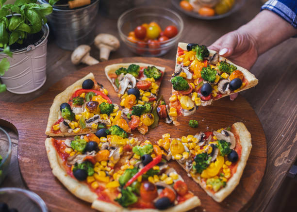 istock Vegetarian Pizza with Broccoli, Cherry Tomato, Pepper and Mushrooms 1955807148