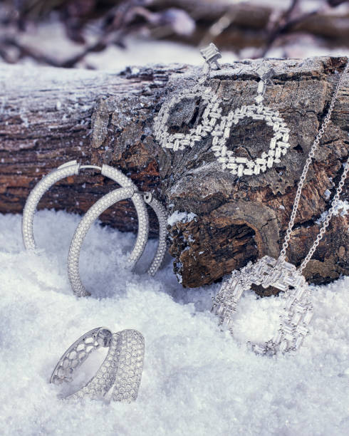 precious jewelry between pieces of blue ice with an empty space for inscriptions close-up