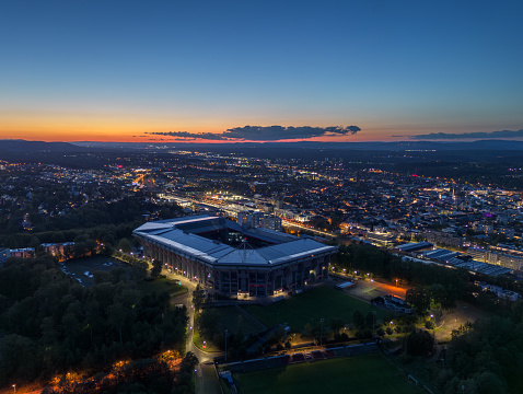Aerial night panoramic skyline cityscape of Kaiserslautern city. Kaiserslautern, Rhineland-palatinate, Germany - October, 2023
