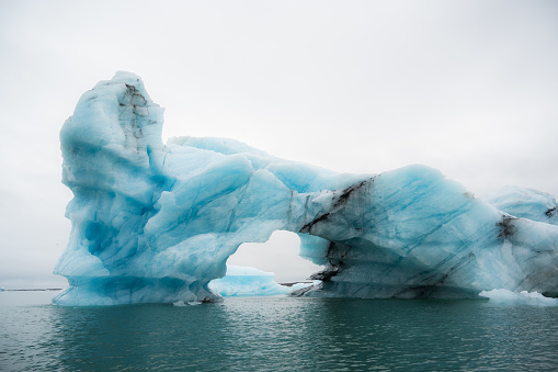 Closeup of an iceberg in Jokulsarlon glacier lagoon. travel destination and seascape concept