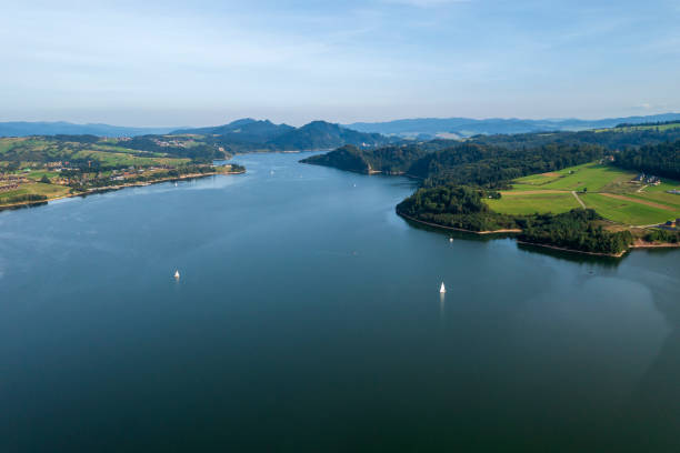 Aerial view of a beautiful recreational region with lakes, forests and mountains in summer.