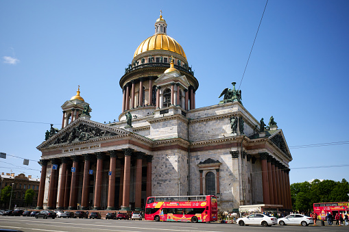 Sankt Petersburg, Russia - June 02, 2023: St. Isaac's Cathedral is the largest cathedrals in the world on a sunny day, St. Petersburg, Russia, clear blue sky