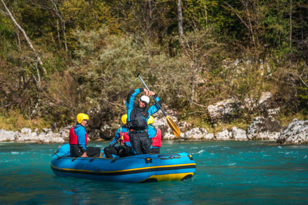 istock Diverse Mature Friends Enjoy River Rafting Adventure 1956106094