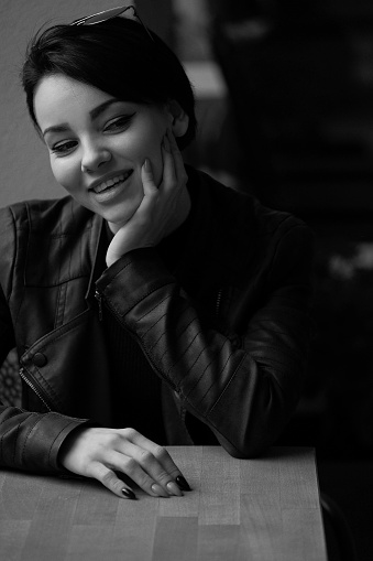 Black and white portrait of a smiling woman