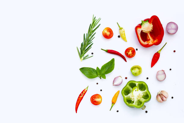 istock Various fresh vegetables and herbs on white background. 1956122419