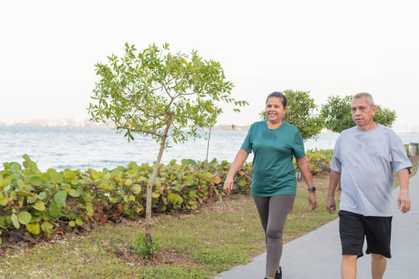 Senior Couple Enjoying a Seaside Walk