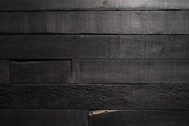 istock Old black wooden board background 1956177953