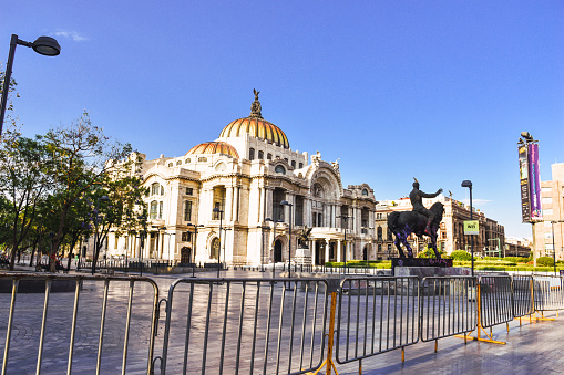view of the Palacio de Bellas Artes or Palace of Fine Arts, a famous theater, museum and music venue in Mexico City