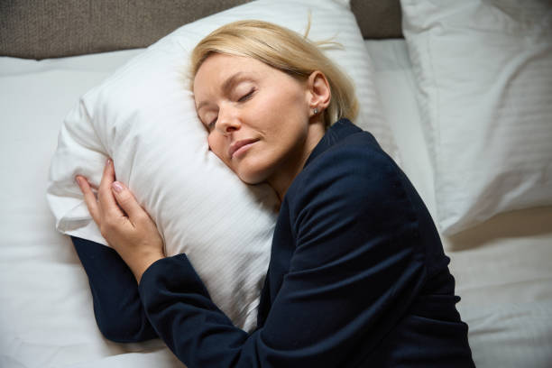 istock Tired female entrepreneur is dozing in her bedroom 1956281129