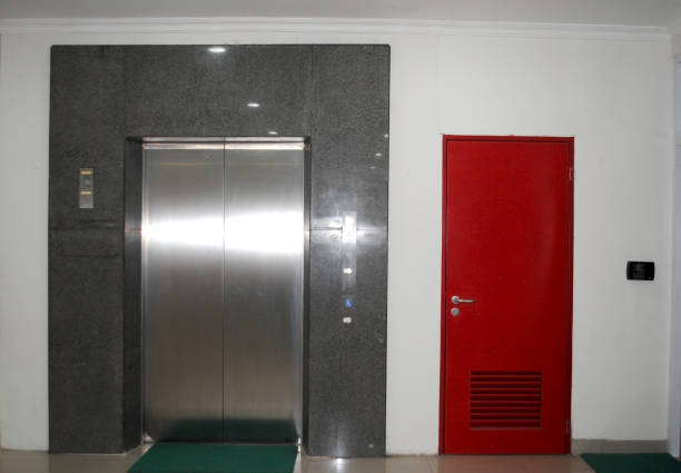 istock Elevator door and fire station. 1956349543