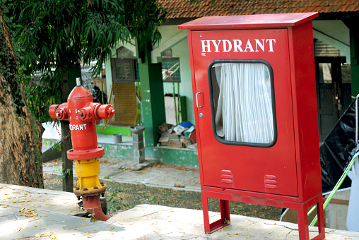 A hydrant is a vertical pipe that is connected to a town's main water system. It can supply water, especially for fighting fires.