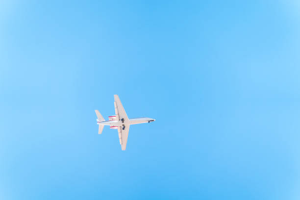 istock Airplane Cessna 680 before landing in blue sky. 1956370298