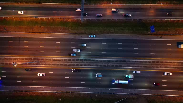 Aerial Top Down View of Traffic Jam on a Highway at Night.