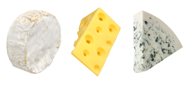 Collection of cheeses on an isolated white background. Maasdam, blue cheese, camembert