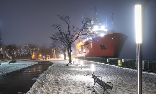 A Canadian Coast Guard icebreaker ship is shown moored in Windsor, Ontario.