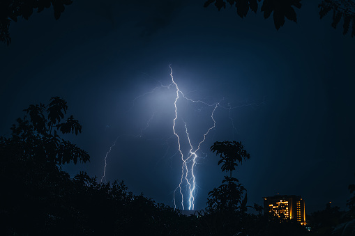 Detailed image of lightning bolts and all the side branches during a severe thunderstorm.