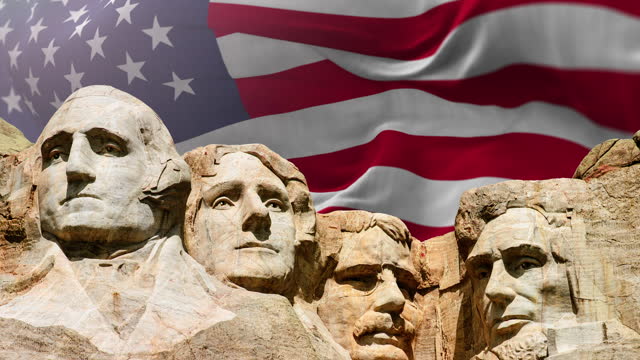 4K video of Mt. Rushmore with Flag United States of America