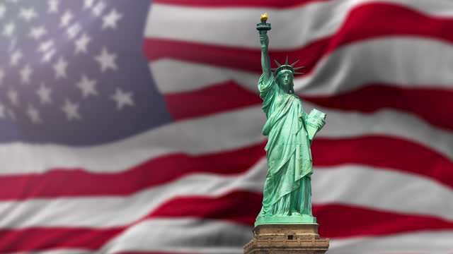 4K video of Statue of Liberty with Flag United States of America