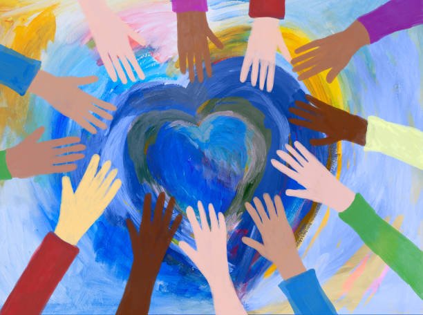 istock Heart and hands painting, hand reaching to heart painted shape. 1956522176