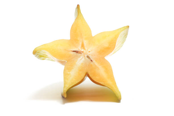 istock Half cut fresh organic star fruit delicious front view isolated on white background clipping path 1956522805