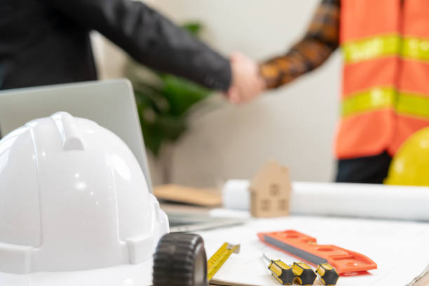 istock Construction team hands shaking greeting start up plan new project contract in office center at construction site, industry ,architecture, partner, teamwork, agreement, property, contacts. 1956529133