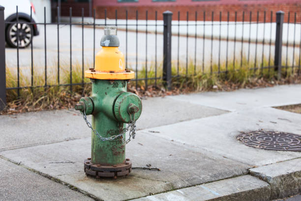 istock urban scene with a red fire hydrant standing tall on a sunlit street corner, symbolizing safety and preparedness 1956548368