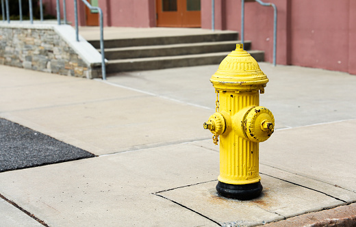 Fire hydrant with yellow and white parts