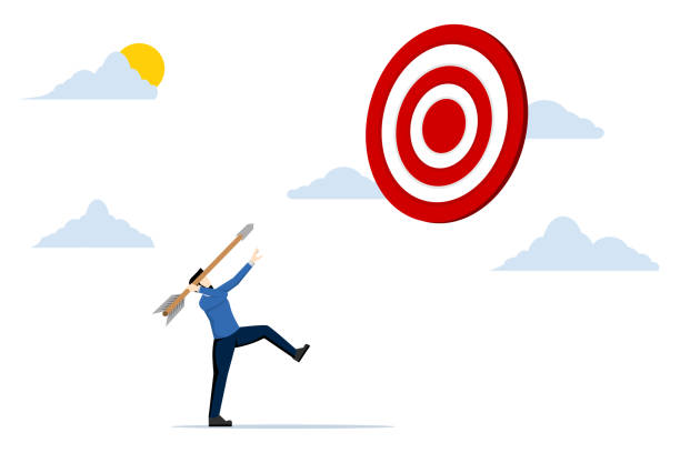 istock Concept Aiming for a big goal, businessman throwing a big dart aiming to hit the dartboard on target, challenge to reach the target, success or accuracy, ambition to reach the target business concept. 1956658742